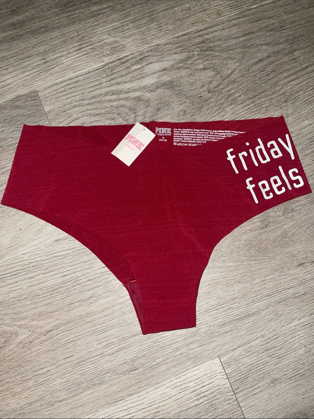 PINK Victoria's Secret Burgundy Seamless Hipster with "friday feels" Print